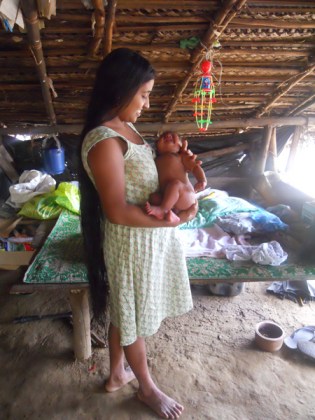 The longest hair I’ve ever seen! Hers is the last family to remain within the park boundary.  What does her baby’s future hold?